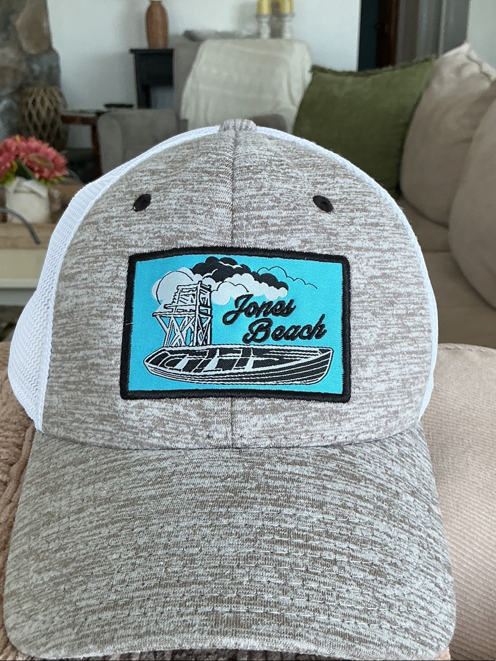 White Mesh Trucker Hat with Mint and Black Logo Patch by the game